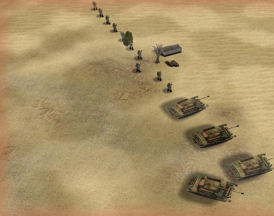Infantry walking in single file behind four camouflaged tanks across open desert.
